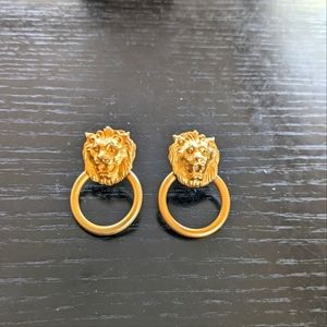 Gold tone lion hoop clip-on earrings